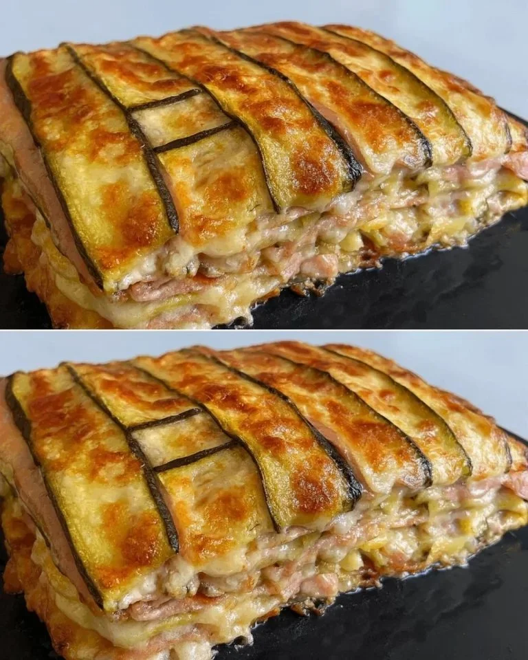 Deliziosa Parmigiana di Zucchine servita in un piatto bianco