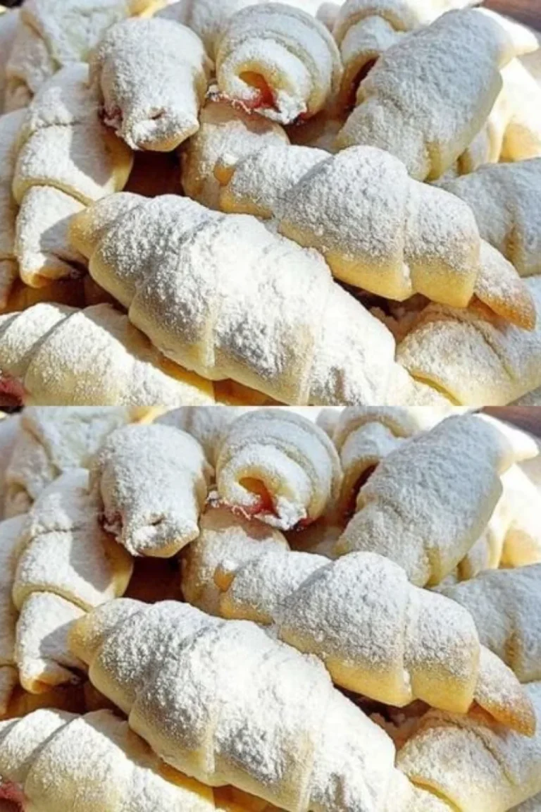 Calli veloci ripieni di confettura di ciliegie su un piatto bianco