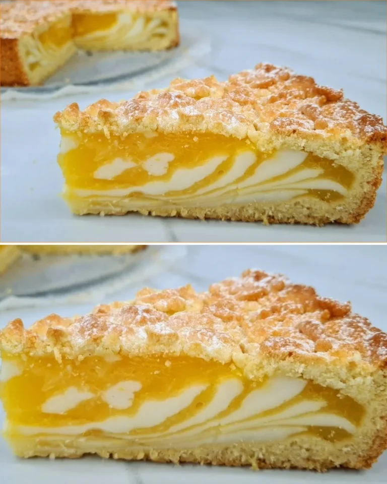 Fetta della Torta alla Crema d'Arancia fresca e appetitosa