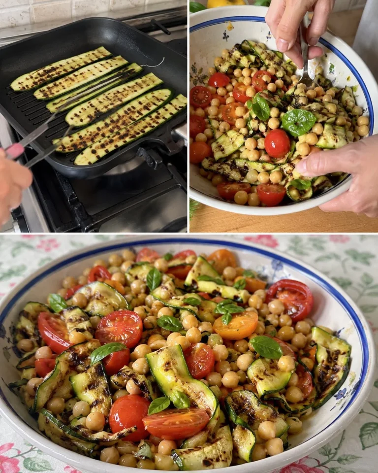 Insalata tiepida con zucchine, ceci e pomodorini servita in un piatto